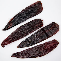 Closeup of 1400S SPICES guajillo descolados stemless chiles highlighting versatile heat potential