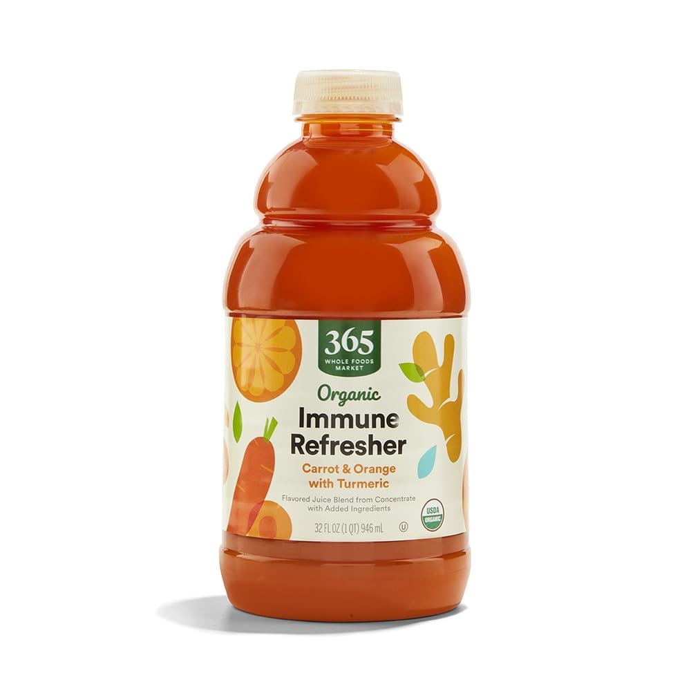 365 by Whole Foods Market organic carrot orange turmeric juice bottle shows natural ingredients.