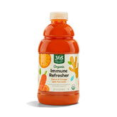 365 by Whole Foods Market organic carrot orange turmeric juice bottle shows natural ingredients.