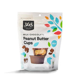 365 by Whole Foods Market mini cups unwrapped, creamy peanut butter center for a satisfying bite.