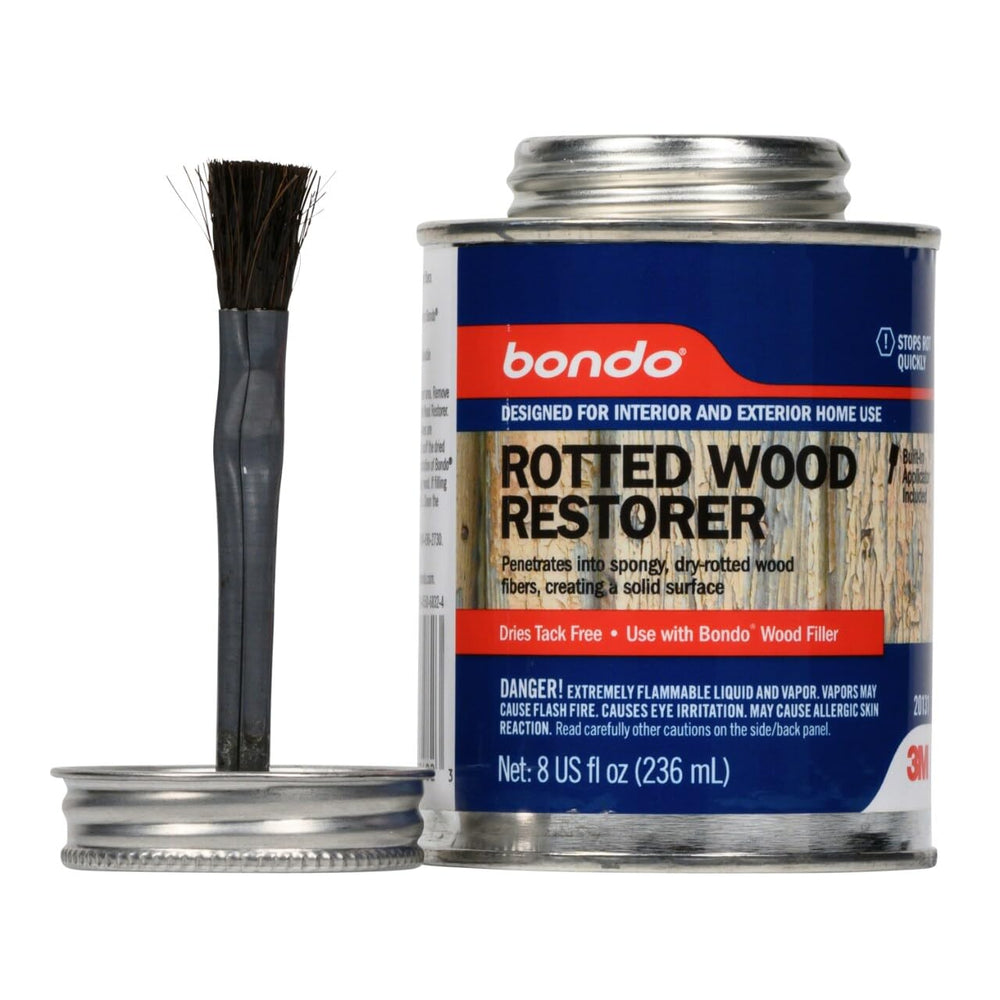 3M Bondo Rotted Wood Restorer applying to rotted wood fibers to halt decay.