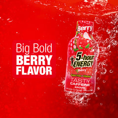 Hand holding 5-hour ENERGY Shots Extra Strength Berry bottle for on-the-go energy.