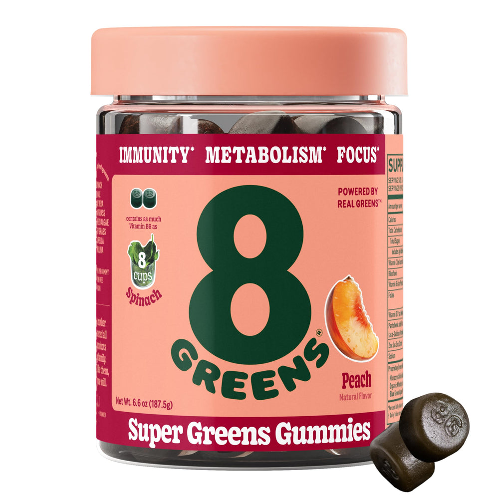 8Greens Peach Gummies bottle on kitchen counter, convenient daily greens on the go.