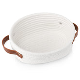 ABenkle small woven basket in oval white, ideal for compact storage.