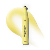 Abib retinal eye serum roller closeup showing precise application for targeted under-eye care