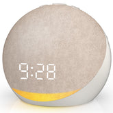 Acedeck sound machine alarm clock on nightstand for sleep-friendly ambiance.