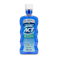 ACT Restoring Fluoride Mouthwash bottle in Cool Mint for enamel support