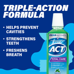 Rinse action with ACT Total Care Zero Alcohol Mouthwash Fresh Mint.