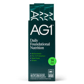 AG1 tub with scoop shows convenient daily nutrition support.
