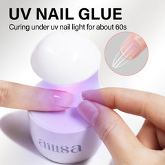 AILLSA gel nail glue curing under UV/LED lamp in 60 seconds for secure tip attachment.