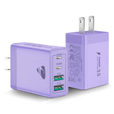 Aiminu 40W four-port USB-C charger front view powering multiple devices.