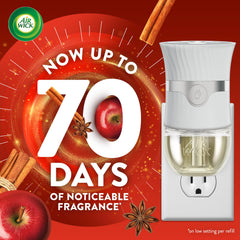 Air Wick plug-in refill bottle close-up highlighting fragrant Apple Cinnamon Medley for seasonal scent.