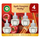 Air Wick plug-in refill bottle delivers Apple Cinnamon Medley for a warm living room ambiance