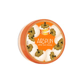 Airspun loose powder translucent bottle closeup highlighting talc-free, ultra-light texture