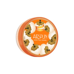 Airspun loose powder translucent bottle closeup highlighting talc-free, ultra-light texture