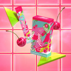 Alani Nu Cherry Twist Energy Stick dissolving in water to create a flavored drink.
