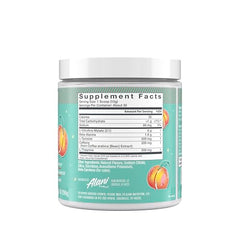 Scooped serving of Alani Nu Juicy Peach pre-workout for quick endurance boost.