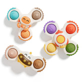 ALASOU pop suction spinner on fridge boosts hand-eye coordination and keeps toddlers engaged.
