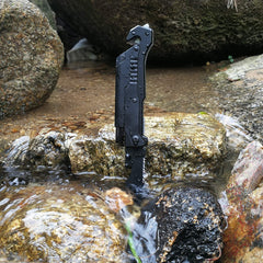 ALBATROSS 6-in-1 survival knife with magnesium fire starter for sparks.