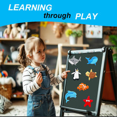 ALNETI dolphin magnet sparks imaginative undersea play on a whiteboard.