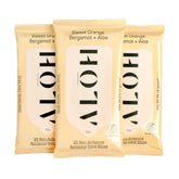 ALŌH Sweet Orange Bergamot wipes pack front displaying soft, luxurious texture for on-the-go cleaning