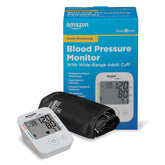 Amazon Basic Care blood pressure monitor with wide cuff in use for quick checks at home.