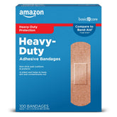 Amazon Basic Care heavy-duty fabric bandage close-up on skin for tough protection.