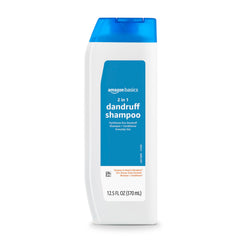 Amazon Basics 2-in-1 shampoo label close-up highlights zinc formula for scalp care