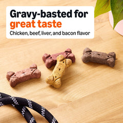 Amazon Basics Crunchy Dog Biscuits closeup texture; supports chewing and fresh breath.