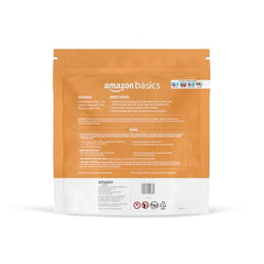 Amazon Basics laundry pacs on a washing machine demonstrate simple one-pod-per-load use.