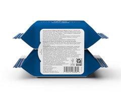 Amazon Basics towelettes in hand, highlighting soft texture for easy makeup removal.