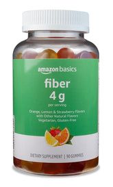 Amazon Basics Soft Fiber Gummies bottle on countertop for daily digestive support.