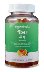 Amazon Basics Soft Fiber Gummies bottle on countertop for daily digestive support.