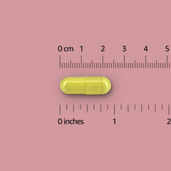 Amazon Elements CoQ10 capsules inside bottle, two-month supply for daily use.