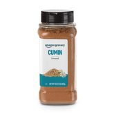Amazon Grocery ground cumin 16 oz bottle enhances warm Tex-Mex flavors.
