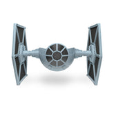 Amazon STAR WARS TIE Fighter Stand displays Echo Dot on a stylish desk setup.