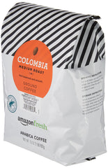 Amazon Fresh Colombia ground coffee beans close-up showing rich aroma for everyday brewing.