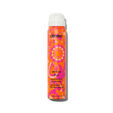 Amika Perk Up Plus bottle being poured for quick refresh.