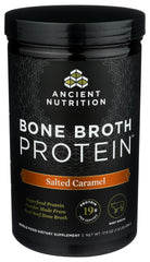 Ancient Nutrition Bone Broth Protein being poured into a cup for mixing.