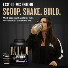 Pouring Animal Whey Isolate into a glass reveals creamy texture and flavor.