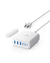 Anker desktop charger with a 6-port setup powering multiple devices efficiently