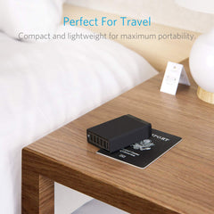 Anker PowerPort 6 on a clean desk setup powering multiple devices.