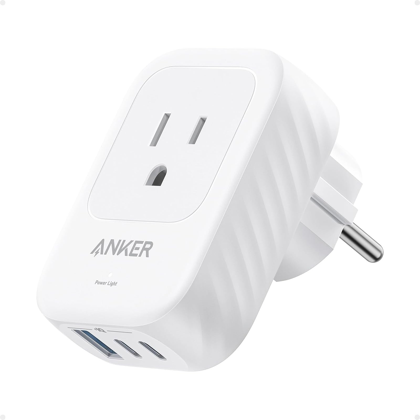 Anker Travel Adapter Type E/F plugged into European outlet for safe charging.