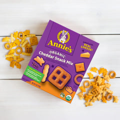Annie's Cheddar Snack Mix packaging highlights organic and non-GMO goodness.