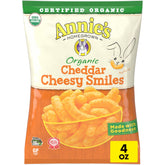 Annie's Organic Cheddar Cheesy Smiles baked puffs in bag, gluten-free kid-friendly snack.
