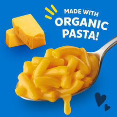 Organic pasta inside the cup signals wholesome ingredients.