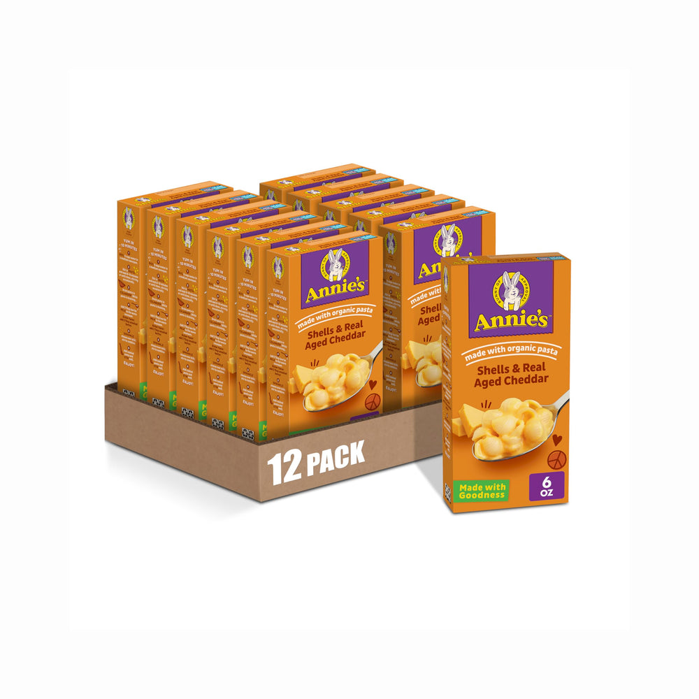 Annie's Shells and Real Aged Cheddar packaging for organic pasta convenience.