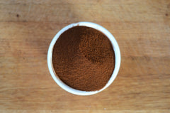 Steaming cup of Anthony's Organic Instant Coffee highlights aroma and plant-based energy