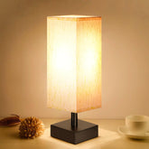 Aooshine small table lamp with beige linen shade for a warm bedside glow.
