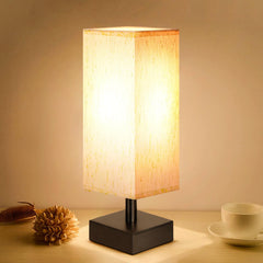 Aooshine small table lamp with beige linen shade for a warm bedside glow.